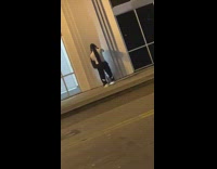 Guy rap music video flashlight below night