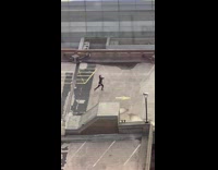 Man run on rooftop film selfie video