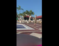 Woman printed dress on poolside part 2