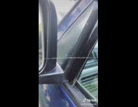 Spiderweb that looks like a sound wave twisted by the filmer