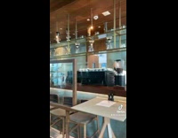 Girl enjoys restaurant food and view 