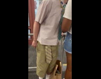 Man with strange fashion sense inside CVS