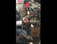 Guy plays with two dolls action figures 