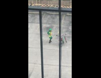 Woman ninja turtle costume spin around empty parking lot