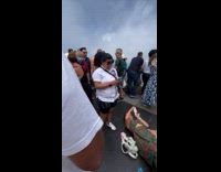 Woman lie down better angle of statue