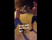 guy blue short hits watermelon with head 