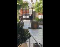 Guy blue jacket practice punch fountain security