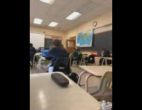 Socially distant classroom silent students kids laptops 