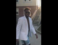 Skit of basketball player wearing a white blazer