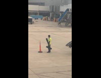 Runway employee arm exercise during work time