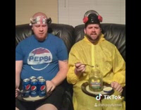 Blue pepsi shirt guy coughs black couch