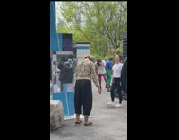 Unknown group exercise at park with twitching and incoherent screams