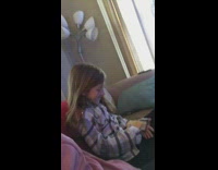 Little girl gets slapped in the face with a slice of cheese