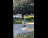 Boy rides scooter at national park