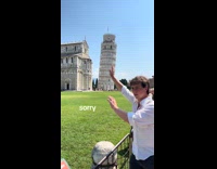 Collab Clips MPUGC - Man pretends to stroke tower of Pisa 