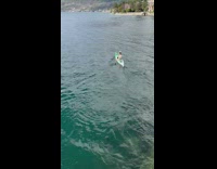 Woman falls into water when trying to get onto kayak