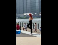 Collab IITW - Woman covers breasts for photoshoot near carousel