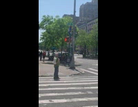 Spiderman climbs pole