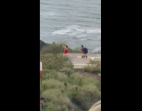 Lady Poses on Off-Limit Helipad for Pictures