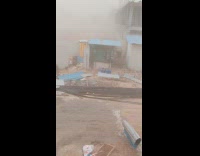 Dust storm moves roof and fogs outside