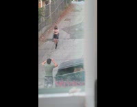 Clear jacket black skirt girl alley dumpster 