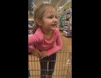 Little girl falls off shopping cart 