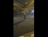 Woman walks up to people doing fireworks then tries to flag police