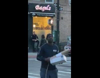 Police man sit chair pose bagel shop