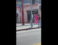 Girl pink fur robe chinatown paper lanterns