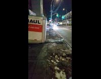 U-Haul trailer wagon side of the street