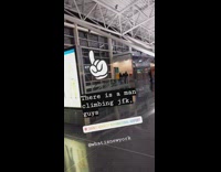 Guy climbs up airport 