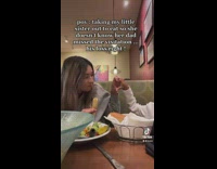 Lady and Kid Bumps Bread and Forms Heart with Hands