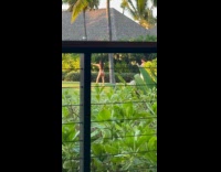 Collab IITW - Woman bikini archery pose beside the tree