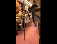 Black Helmet Man Has Razor Scooter on Subway