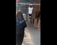 Collab WINY - Man doing pull ups on scaffolding 