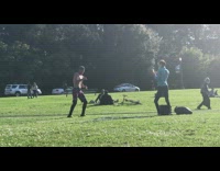 Man shirtless shadow boxing filmer react