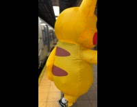 Collab winy - Person wear Pikachu mascot gets off train