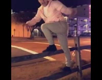 Guy does backflip off wooden fence, breaks fence and lands on head