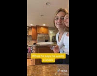 Freeze frame white shirt girl sits plate