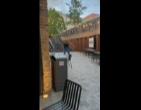 Collab IITW - Man black suit tiktok dance near stairs