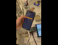 Person pay beer scan bitcoin QR code