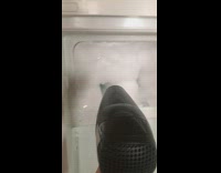 Guy uses hair drier to melt ice