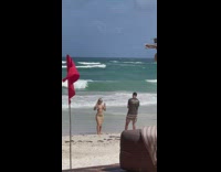 Woman in brown dress poses in Tulum 