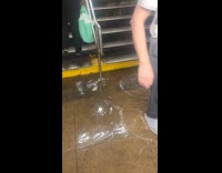 Submitter films flood water at train station