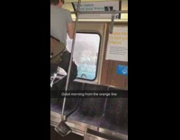 Guy black hat brown satchel pull ups subway train