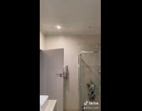 Guy white sunglasses dances bathroom tall short 