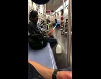 man plays with red white and blue glow stick