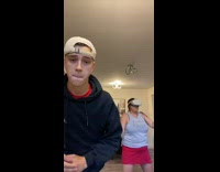 Guy dance beside mom play VR game