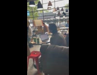 Man feeling at home at coffee shop 