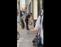 Man tries to put snake inside box